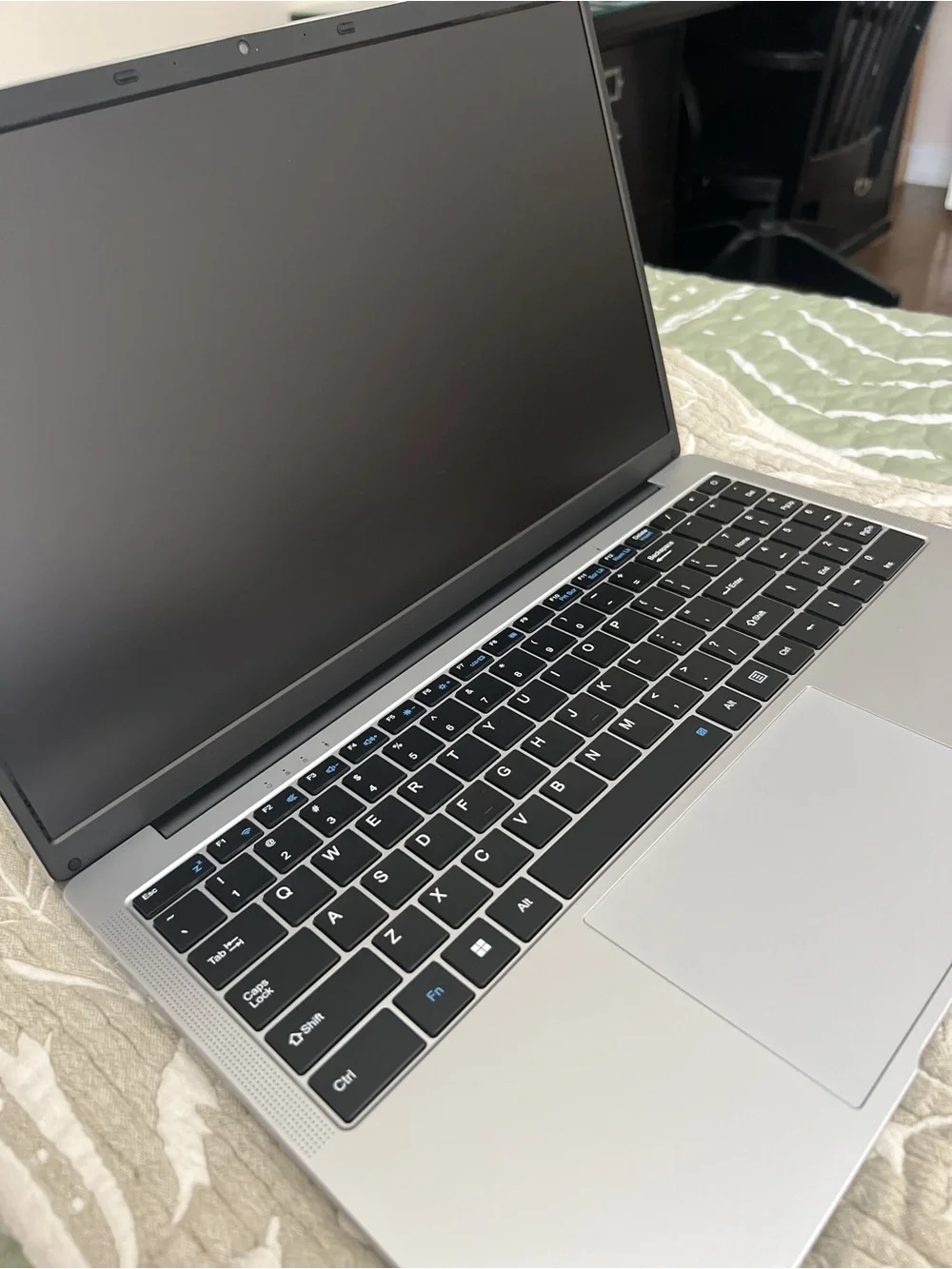 Silver Laptop with Minimal Logo - Modern Portable Computer